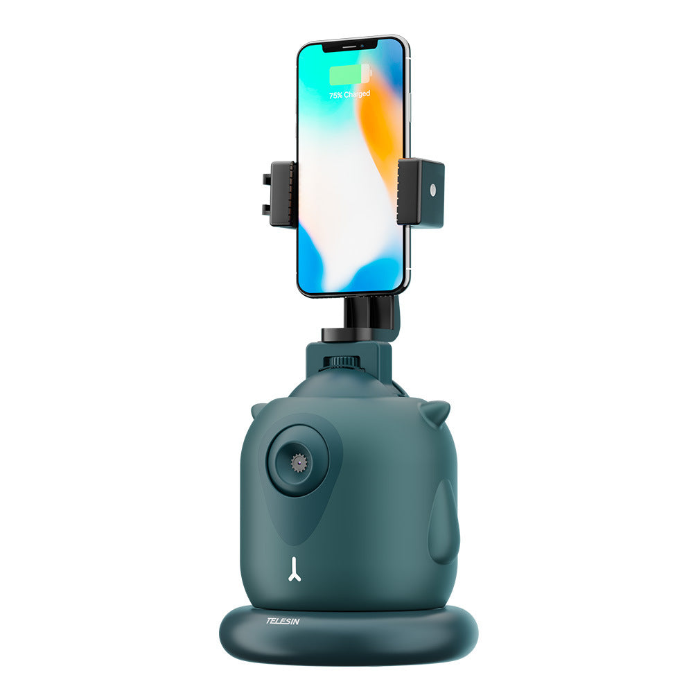 Teal phone holder with smartphone displaying a colorful app interface on a white background