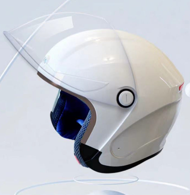White motorcycle helmet with a clear visor on a light gray background