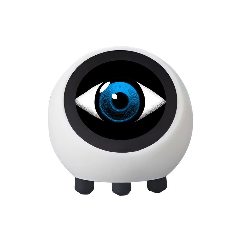 Round white object with an eye design on a white background